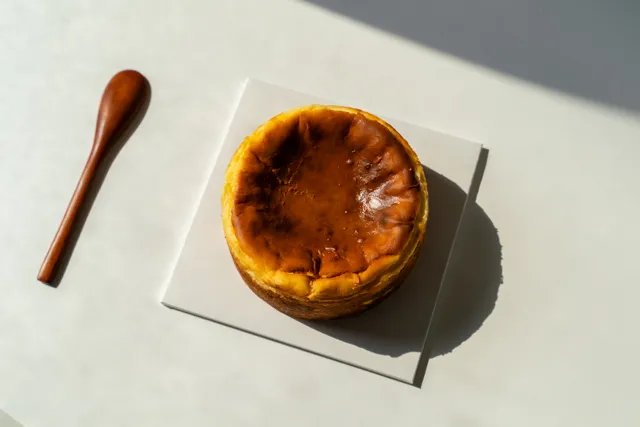Composición de producto con tarta de queso