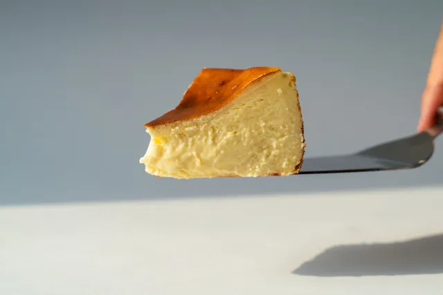 Composición de producto con tarta de queso